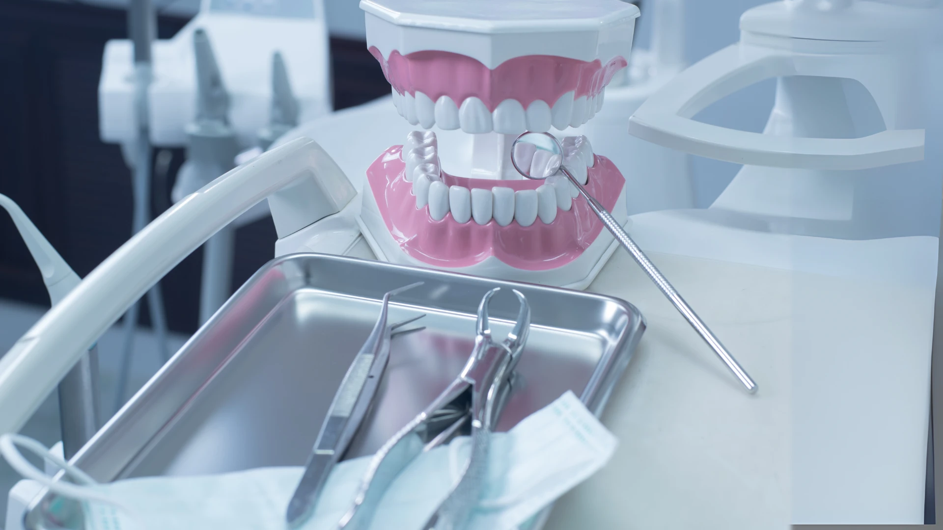 Patient at mirror evaluating results after cosmetic dental work